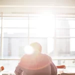 man reading an office directly